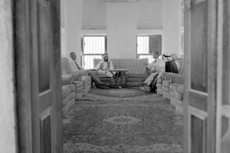 An official reception at Qasr al Hosn in 1962, hosted by Sheikh Shakhbut for oil industry executives.