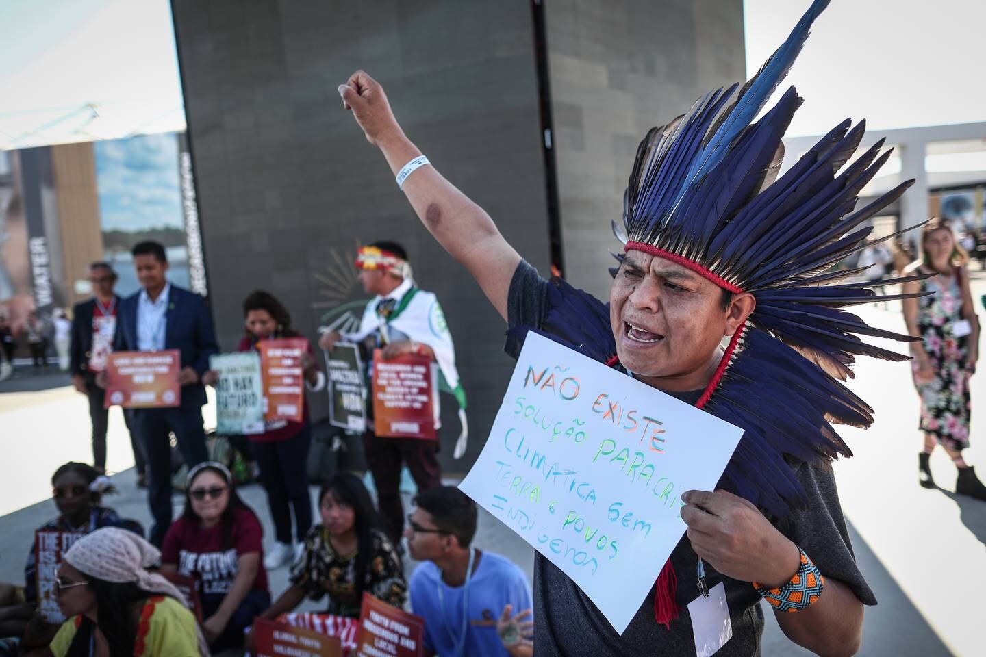 Members of the Amazon indigenous peoples shout slogans as they stage a demonstration during the 2022 UN climate summit in Egypt. EPA
