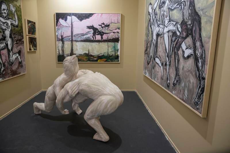 Maitha Abdalla's paintings and sculpture at the Tabari Artspace booth. Photo: Antonie Robertson / The National