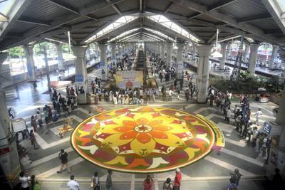 NAVI MUMBAI, INDIA - SEPTEMBER 4: Floral Rangoli made on the occasion of Onam at Panvel Railway Station by Keraliya Cultural Society Panvel on September 4, 2017 in Navi Mumbai, India. Onam is an annual harvest festival of Kerala. The festival is mainly celebrated by Malayalees around the world with traditional folk dances, artworks, etc. According to the Onam story and its popular myth, Lord Vishnu in his Vamana avtar sents King Mahabali to hell as the gods becomes jealous of his popularity. But grants him a boon that the king can visit his subjects once in a year. Thus, it is believed that Onam is celebrated as King Mahabali's visit to the place. It is the only festival in which both the winner and the defeater are worshipped. Onam Festival falls during the Malayali month of Chingam (Aug - Sep) and marks the homecoming of legendary King Mahabali. Carnival of Onam lasts for ten days and brings out the best of Kerala culture and tradition. (Photo by Bachchan Kumar/ Hindustan Times via Getty Images)