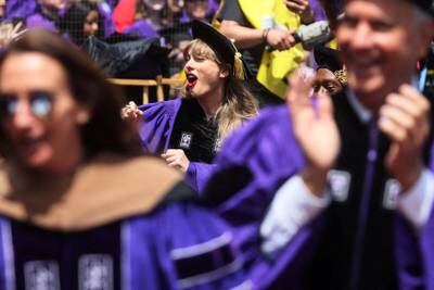 Swift in the sea of celebrating graduates. Reuters