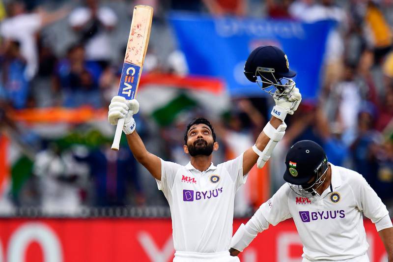 India's Ajinkya Rahane (L) celebrates scoring his century (100 runs) as teammate Ravi Jadeja (R) looks on during the second day of the second cricket Test match between Australia and India at the MCG in Melbourne on December 27, 2020. (Photo by WILLIAM WEST / AFP) / --IMAGE RESTRICTED TO EDITORIAL USE - STRICTLY NO COMMERCIAL USE--