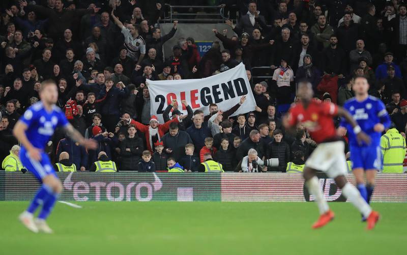 United fans show their support for Solskjaer in Wales. Getty