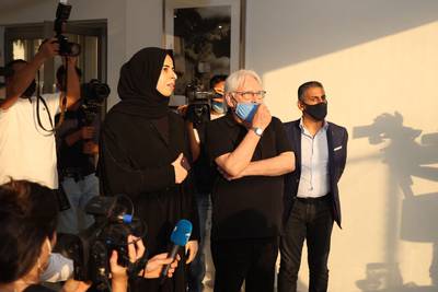 Official spokeswoman of the Supreme Committee for Crisis Management in Qatar, Lolwah Al Khater, and UN Special Envoy for Yemen Martin Griffiths visit the Park View Villas, in Doha, which is now housing Afghan refugees. AFP