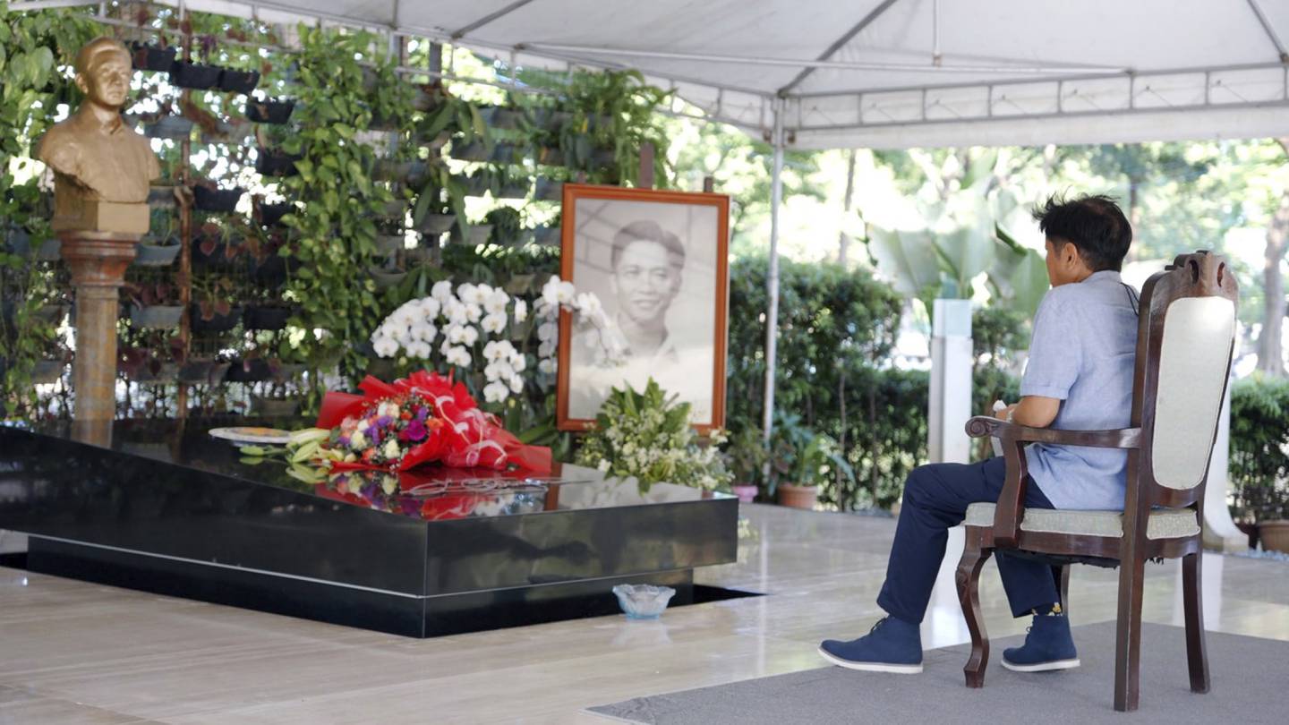 Ferdinand Marcos Jr visits the tomb of his father in Manila, hours after claiming victory in the Philippines' presidential election. AP