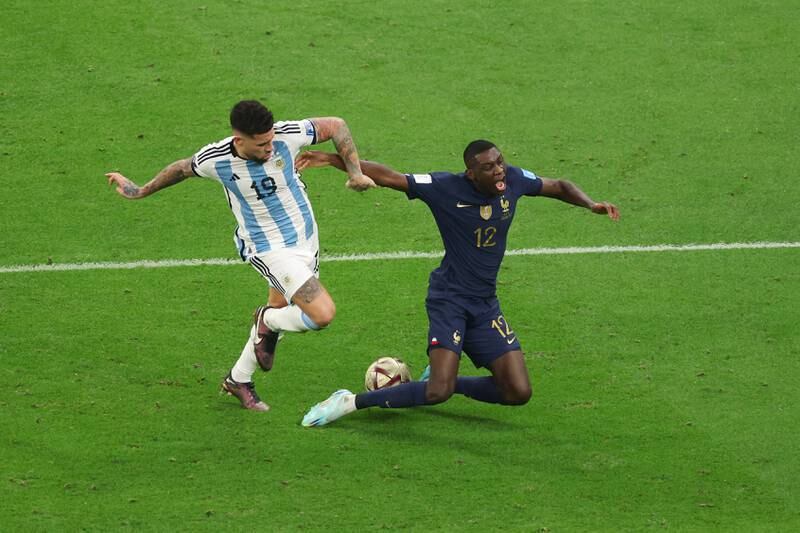 Argentina's Nicolas Otamendi fouls Randal Kolo Muani of France giving away a penalty. Getty