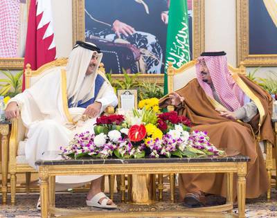 Saudi King Salman meeting Qatari Emir Tamim Al Thani before the opening session of 2015's GCC summit in Riyadh. EPA