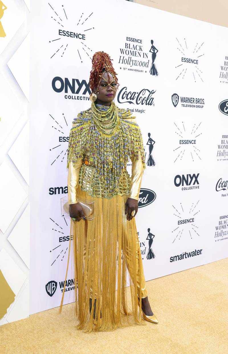 Caroline Wanga arrives at the Essence Black Women in Hollywood Awards. Invision / AP