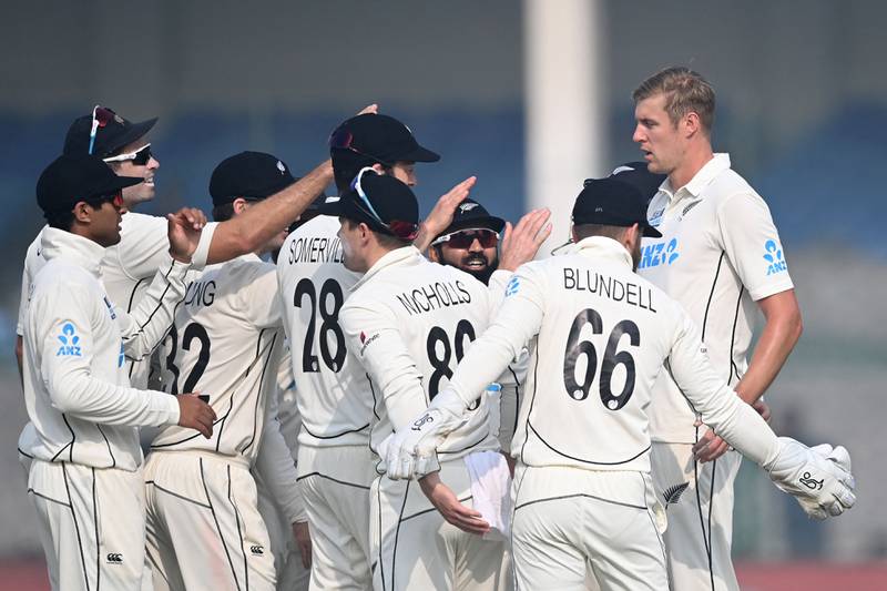 New Zealand bowler  Kyle Jamieson celebrates after the dismissal of India's Cheteshwar Pujara for 22. AFP