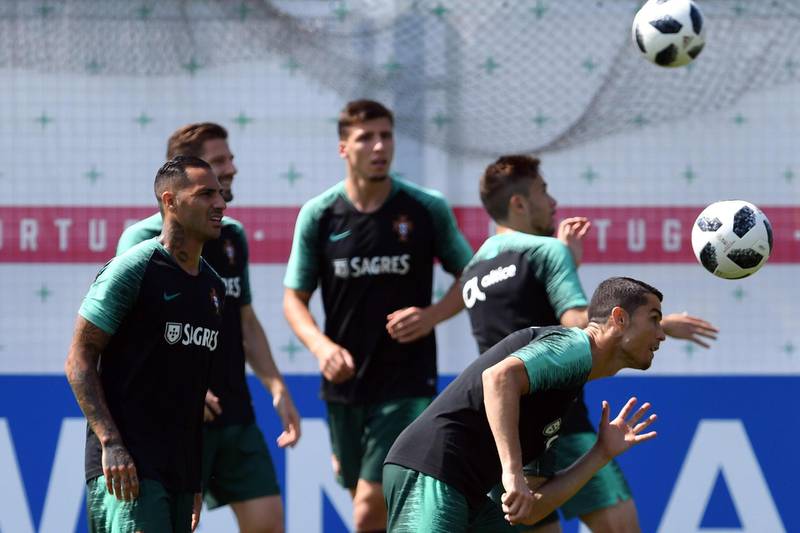 Cristiano Ronaldo, right, practices a training session at the Kratovo training camp in Russia, Ramensky, Moscow, Russia, on June 23, 2018. Francisco Leong / AFP