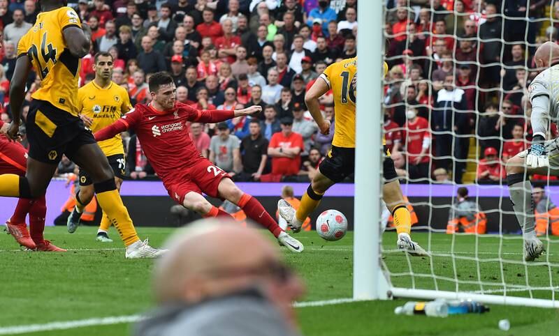 Andy Robertson scores the third goal for Liverpool against Wolves. EPA