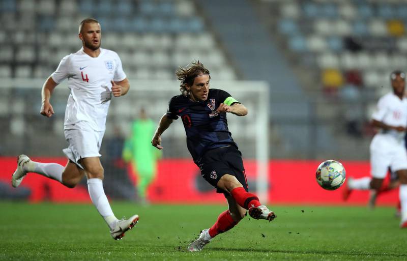 England defender Eric Dier, left, vies with Croatia midfielder Luka Modric. AFP