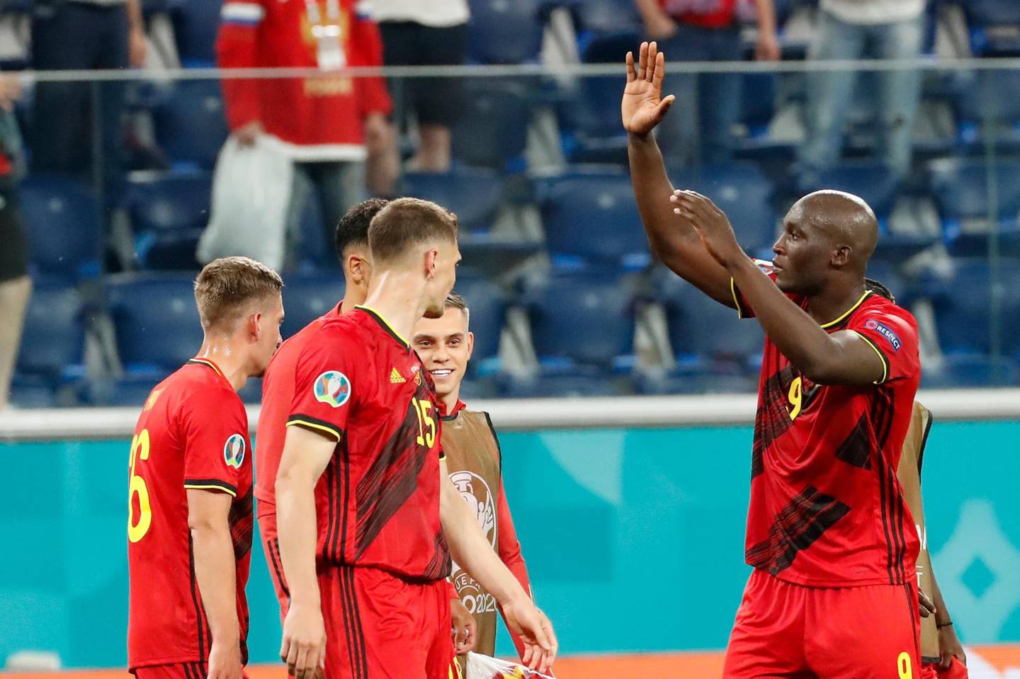 Belgium's Romelu Lukaku, right, salutes supporters at the end of the Euro 2020 soccer championship group B match between Belgium and Russia at the Saint Petersburg stadium in St. Petersburg, Russia, Saturday, June 12, 2021. Belgium beat Russia 3-0.(Anatoly Maltsev/Pool via AP)