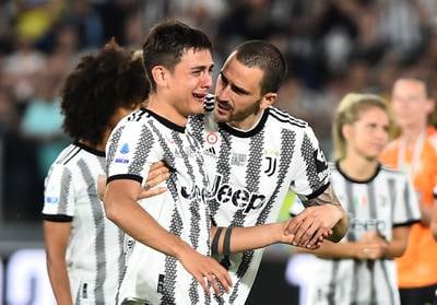 An emotional Paulo Dybala with Juventus teammate Leonardo Bonucci. Reuters