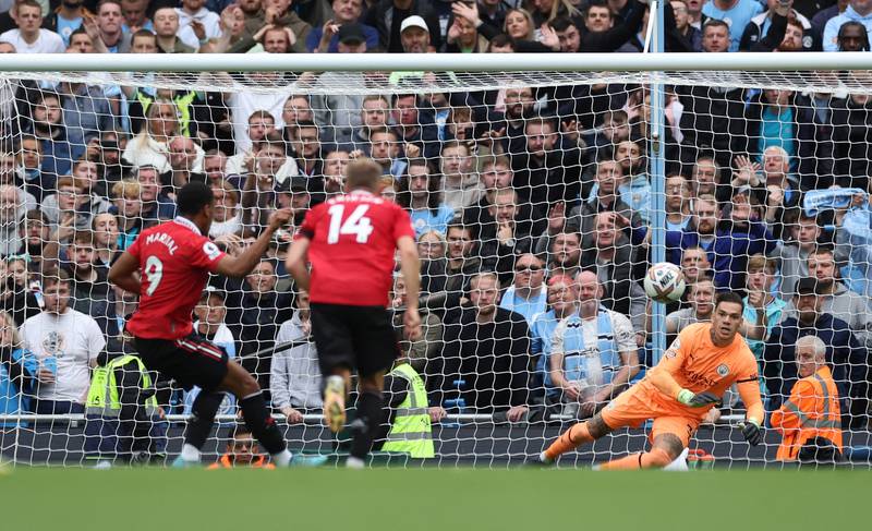 Anthony Martial scores United's third goal from the penalty spot. Reuters. 