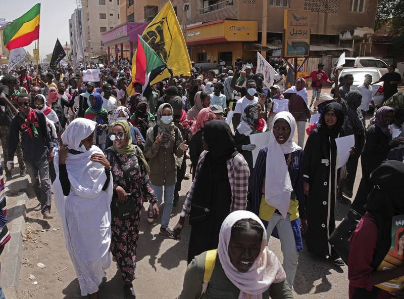 Sudanese anti-coup protesters take part in ongoing demonstrations. AP