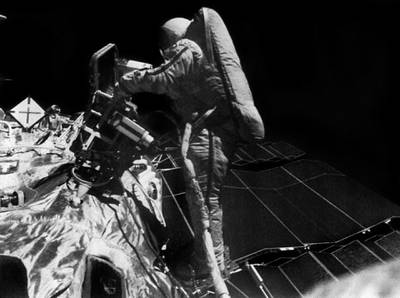 Picture, taken by Soviet commander Vladimir Dzhanibekov, shows the first ever walk into outer space by a woman, Svetlana Savitskaya, during the space mission Soyuz T 12 to the Salyut 7 space station on July 25, 1984. Her EVA lasted 3 hours 35 minutes. (Photo by TASS / AFP)