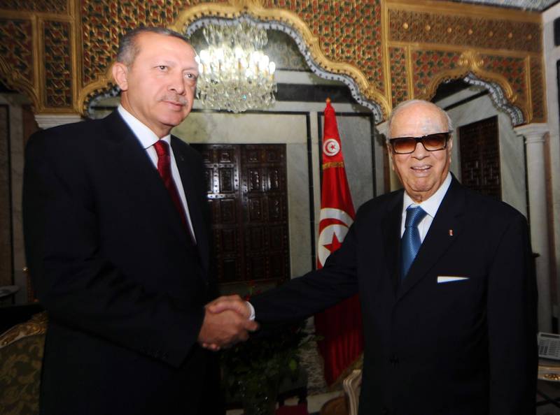 (FILES) A file photo taken on September 15, 2011 shows Essebi with Turkey's Recep Tayyip Erdogan. AFP