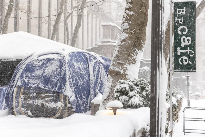 Snow covers a social distancing bubble dining tent outside a restaurant in New York. Bloomberg