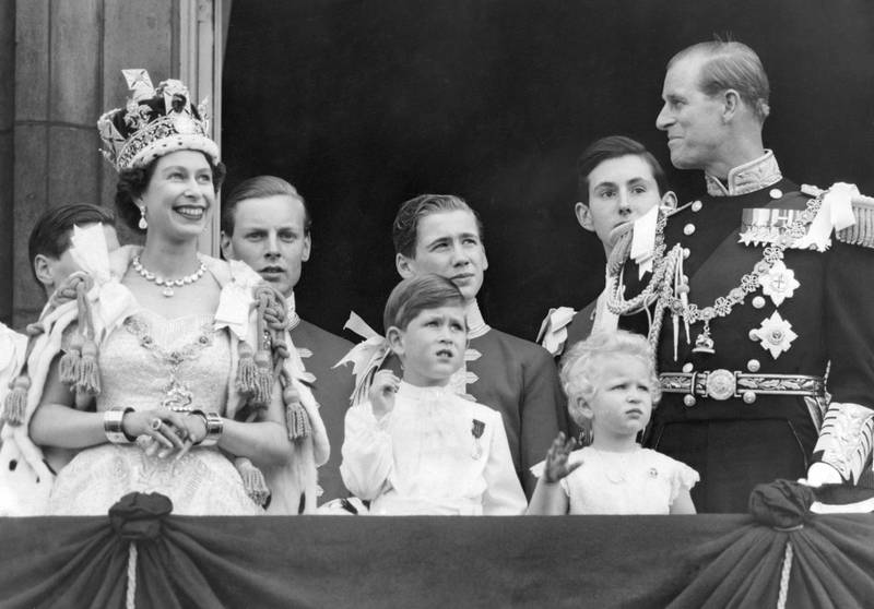 Queen Elizabeth II, Prince Charles, Princess Anne and the Duke of Edinburgh at Buckingham Palace after the Queen's coronation in June 1953. All photos: PA