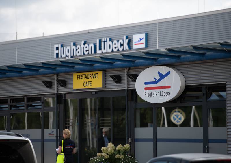 Vaccinations were handed out at Luebeck Airport in northern Germany before police intervened. Getty