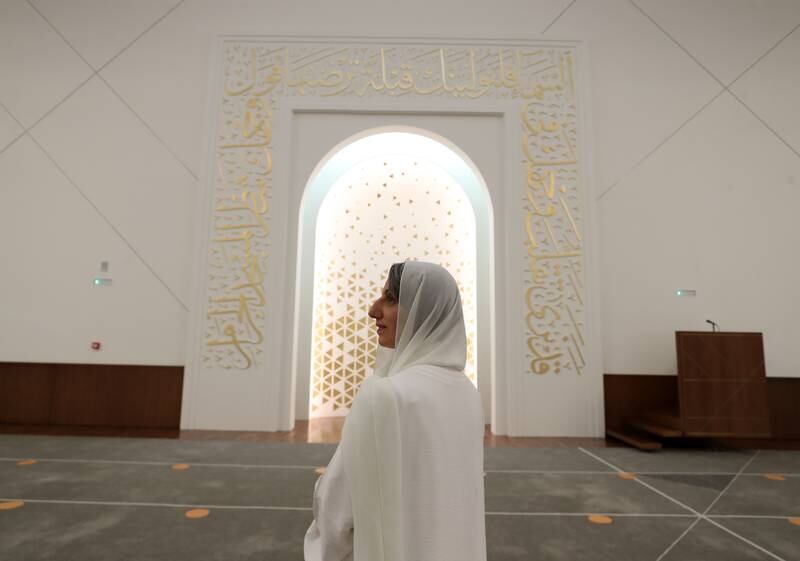 Carefully selected passages from the Quran are stencilled onto the walls around the mihrab.