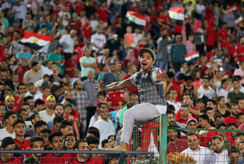 Soccer Football - FIFA World Cup - Egypt Training - Cairo Stadium, Egypt - June 9, 2018 - Egyptian fans cheers the National players during the training in Cairo international staduim in Cairo. REUTERS /REUTERS/Mohamed Abd El Ghany