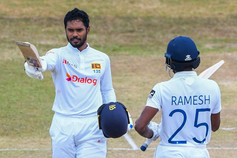 Sri Lanka's Dhananjaya de Silva celebrates after reaching his century. AFP