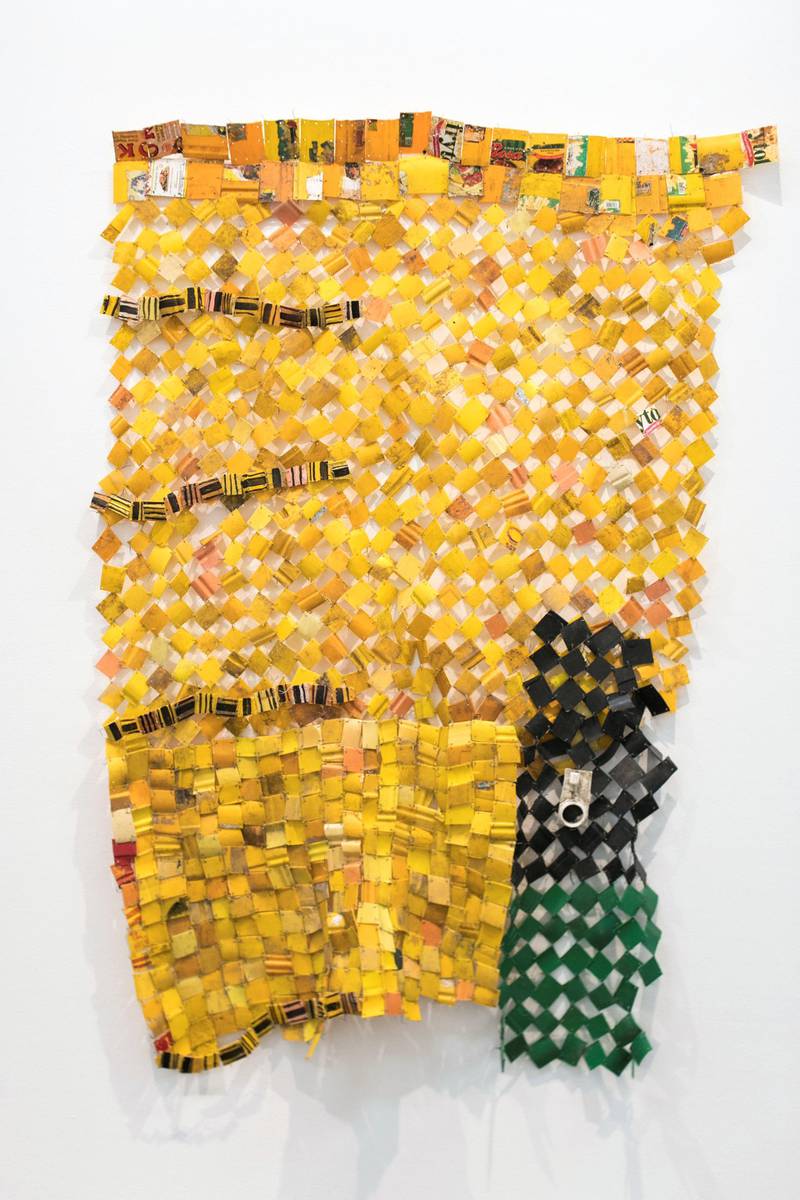 DUBAI, UNITED ARAB EMIRATES - Jan 24, 2018. 

Artworks by Ghanaian artist Serge Attukwei Clottey, at Lawrie Shabibi in Alserkal Avenue.

Serge Attukwei Clottey shows a wall-based sculptures created from yellow gallon containers.

(Photo by Reem Mohammed/The National)

Reporter: Melissa
Section: AC