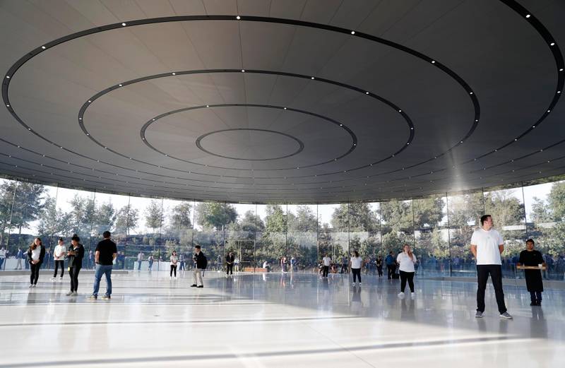 People await the start of a product launch event at Apple's new campus in Cupertino, California. Stephen Lam / Reuters