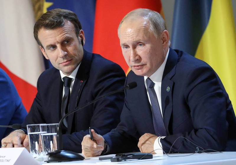 French President Emmanuel Macron and Russian President Vladimir Putin after a summit on Ukraine at the Elysee Palace in Paris, in December 2019. Reuters