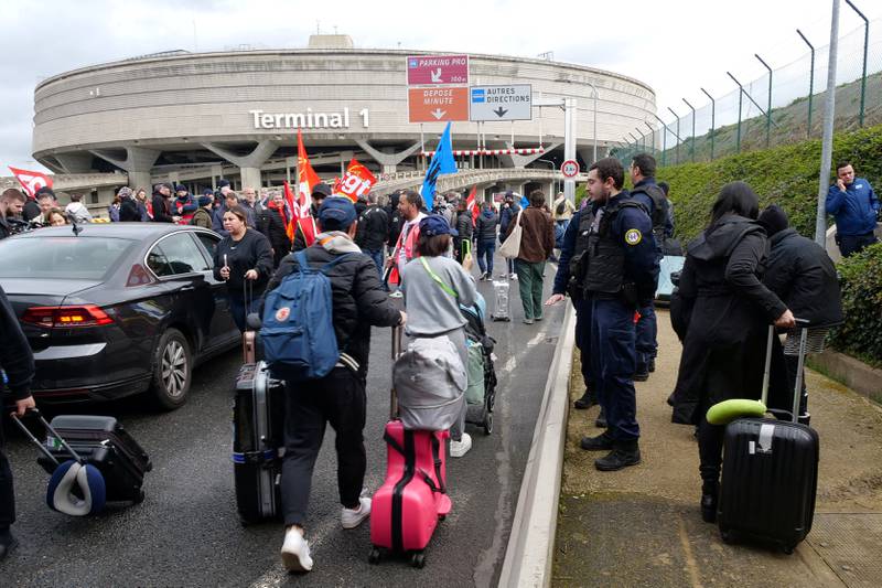 Striking workers blockaded a road to Terminal 1 of Charles de Gaulle Airport. Reuters 
