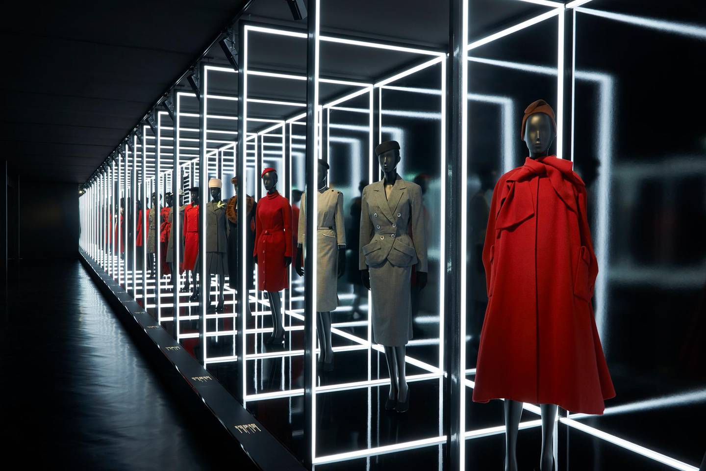 A procession of day looks in the Christian Dior: Designer Of Dreams exhibition. The exhibtion will open in New York in the autumn. Photo by Adrien Dirand