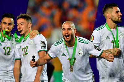 Adam Ounas, Ismail Bennacer, Adlene Guedioura and Andy Delort are jubilant after Algeria's historic success. AFP