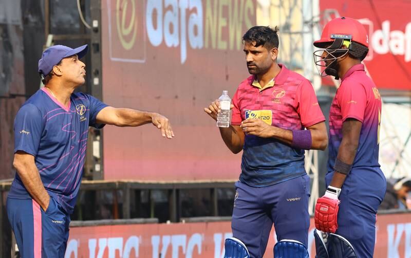 UAE coach Robin Singh gives instructions to Zawar Farid and Karthik Meiyappan in Kathmandu on Friday. UAE lost the CWCL2 match by 56 runs
