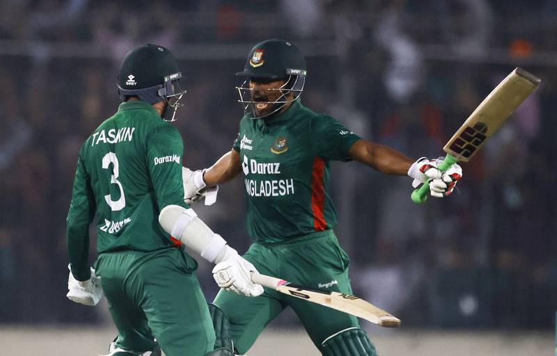 Bangladesh's Najmul Hossain Shanto and Taskin Ahmed celebrate after winning the game in Dhaka. Reuters