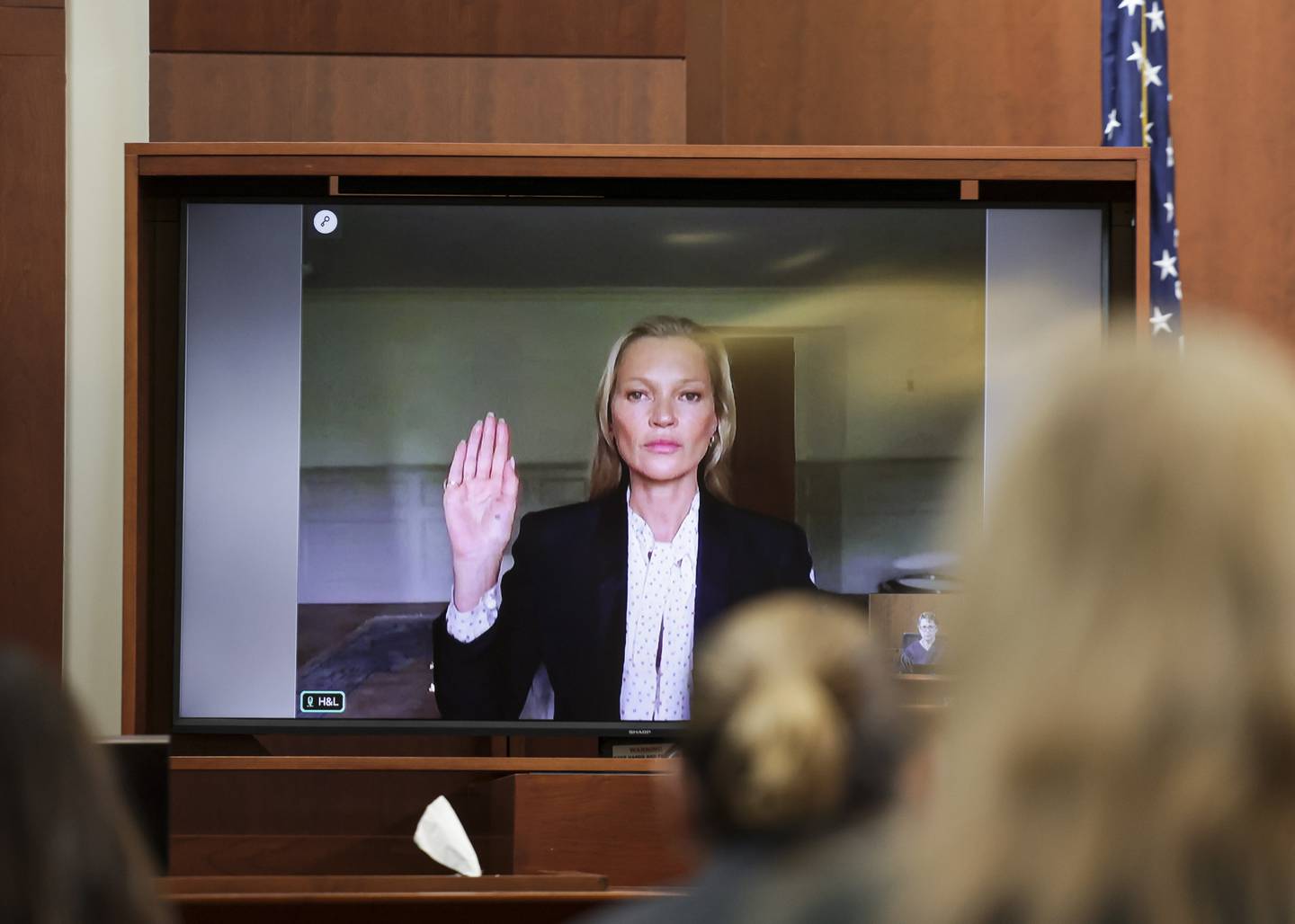 Model Kate Moss, a former girlfriend of actor Johnny Depp, is sworn in to testify via video link during Depp's defamation trial against his ex-wife Amber Heard. EPA