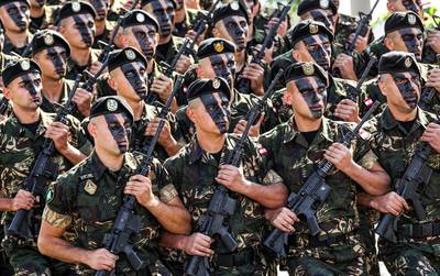 Lebanese police members march in a military parade during an official ceremony commemorating the country’s 73rd independence day in the capital Beirut. Anwar Amro / AFP