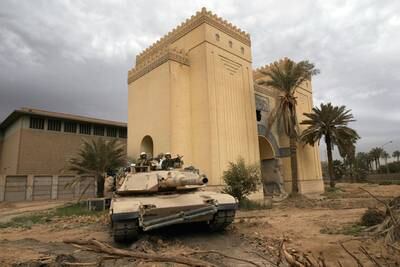 A US tank takes up position outside the plundered Iraqi National Museum in Baghdad on April 16, 2003. Getty Images