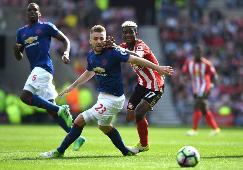 Luke Shaw of Manchester United, left, is challenged by Didier Ndong of Sunderland during the Premier League match at Stadium of Light on April 9, 2017 in Sunderland, England. Shaun Botterill / Getty Images