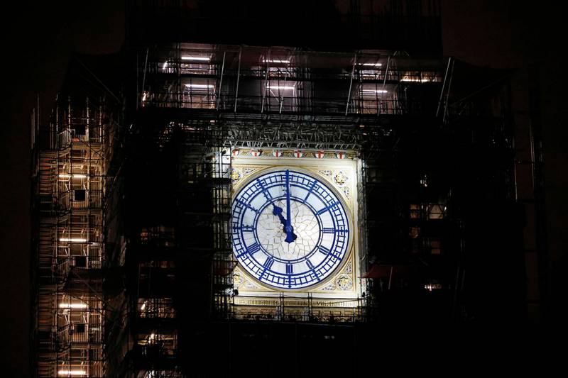 The clock-face on the Elizabeth Tower, commonly known by the name of the bell, "Big Ben" in London, shows 2300 (GMT), as Britain officially leaves the EU (European Union) trading block, on New Year's Eve, December 31, 2020. The UK's tortuous departure from the European Union takes full effect when Big Ben strikes 11:00 pm (2300 GMT) in central London, just as most of the European mainland ushers in 2021 at midnight. / AFP / Tolga Akmen
