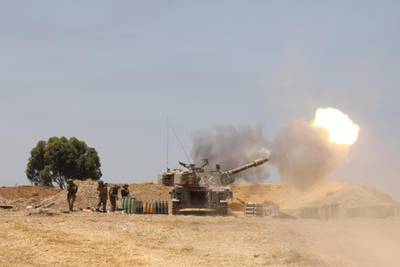 Israeli artillery in action as the escalation continues between the Israeli army and Hamas at the Gaza Border. EPA