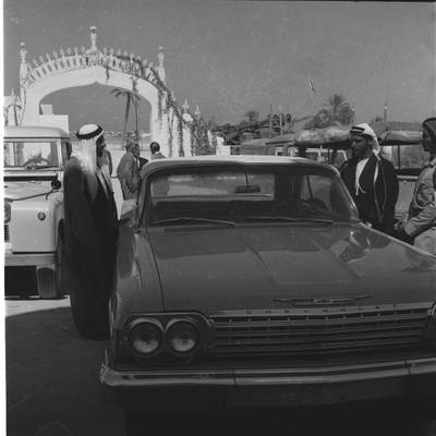 Sheikh Zayed outside Qasr Al Hosn in the early 1960s with his nephew Sheikh Sultan bin Shakhbut and a Chevrolet Bel Air. American cars were popular in Abu Dhabi at this time. Courtesy: Guy Gravett