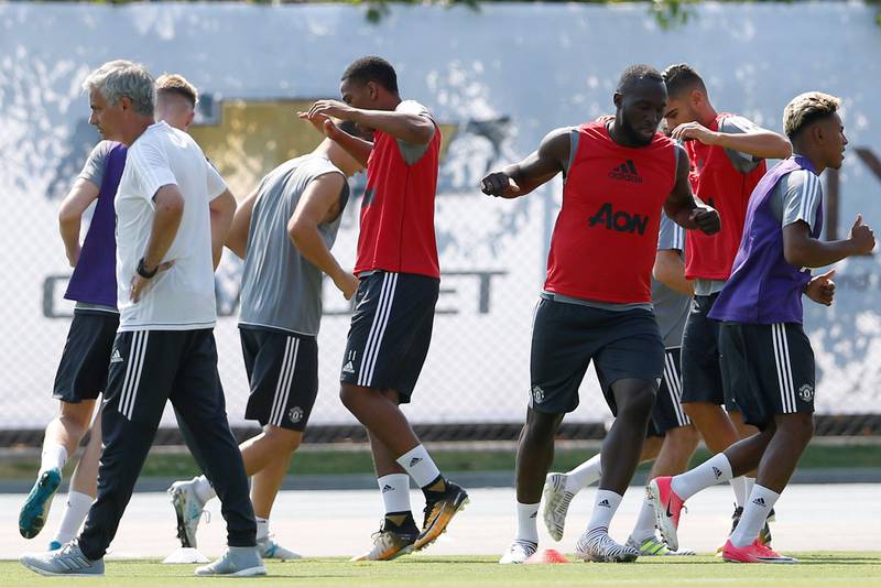 United States Football Soccer - Manchester United training - University of California Los Angeles - July 10, 2017 Manchester United's Romelu Lukaku (3rd R) trains as Jose Mourinho (L) watches training REUTERS/Lucy Nicholson