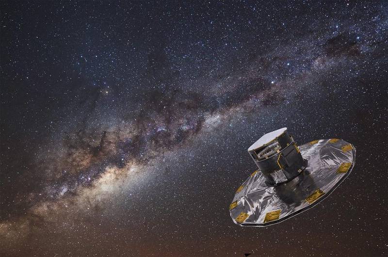 An artist's impression shows the European Space Agency’s Gaia mapping the stars of the Milky Way. S Brunier via Reuters

