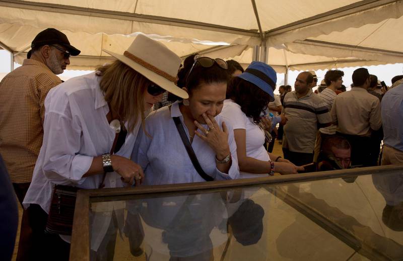 Women look at recently discovered artefacts at the Bent Pyramid. AP