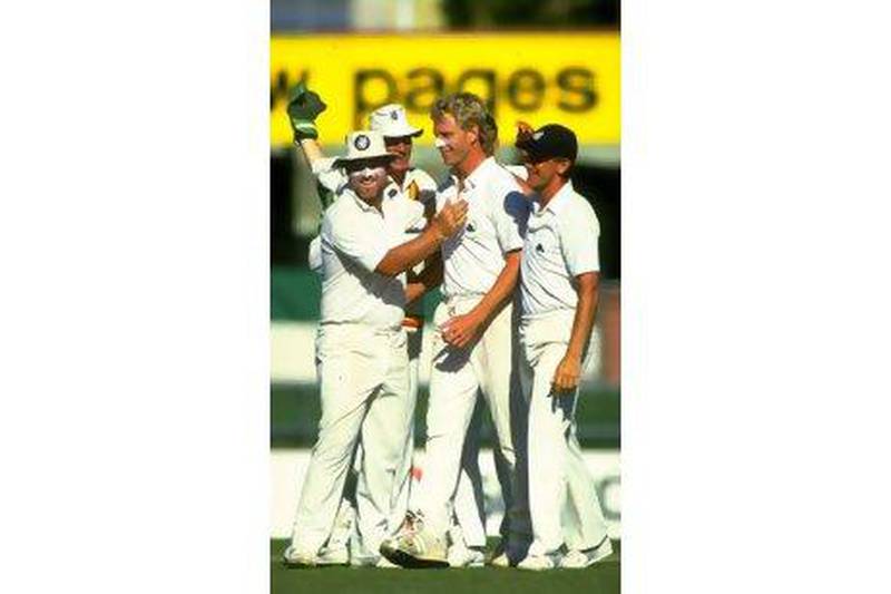Teammates congratulate Graham Dilley after his six-wicket spell in 1986 ensured a rare victory over Australia in Brisbane but individual feats never went hand-in-hand with collective success for him.