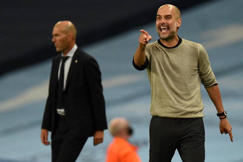 Real Madrid's French coach Zinedine Zidane and Manchester City's Pep Guardiola. AFP