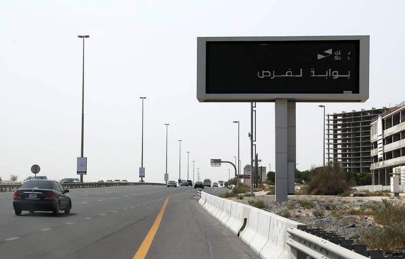 Electronic traffic signs on Umm Sequim St, which is being used to advertise the new Salik IPO scheme in Dubai. Pawan Singh / The National