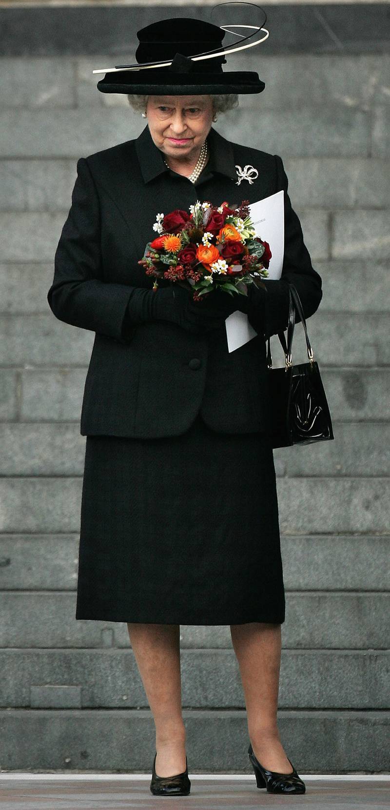 Queen Elizabeth II, in black, leaves St Paul's Cathedral after attending the National Memorial Service dedicated to victims of the July 7 bombings on November 1, 2005, in London. Getty Images